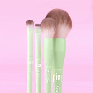 Full Makeup Brush Collection featuring 4 brushes; Lid, Line, Glow and Blush, all on a pink background