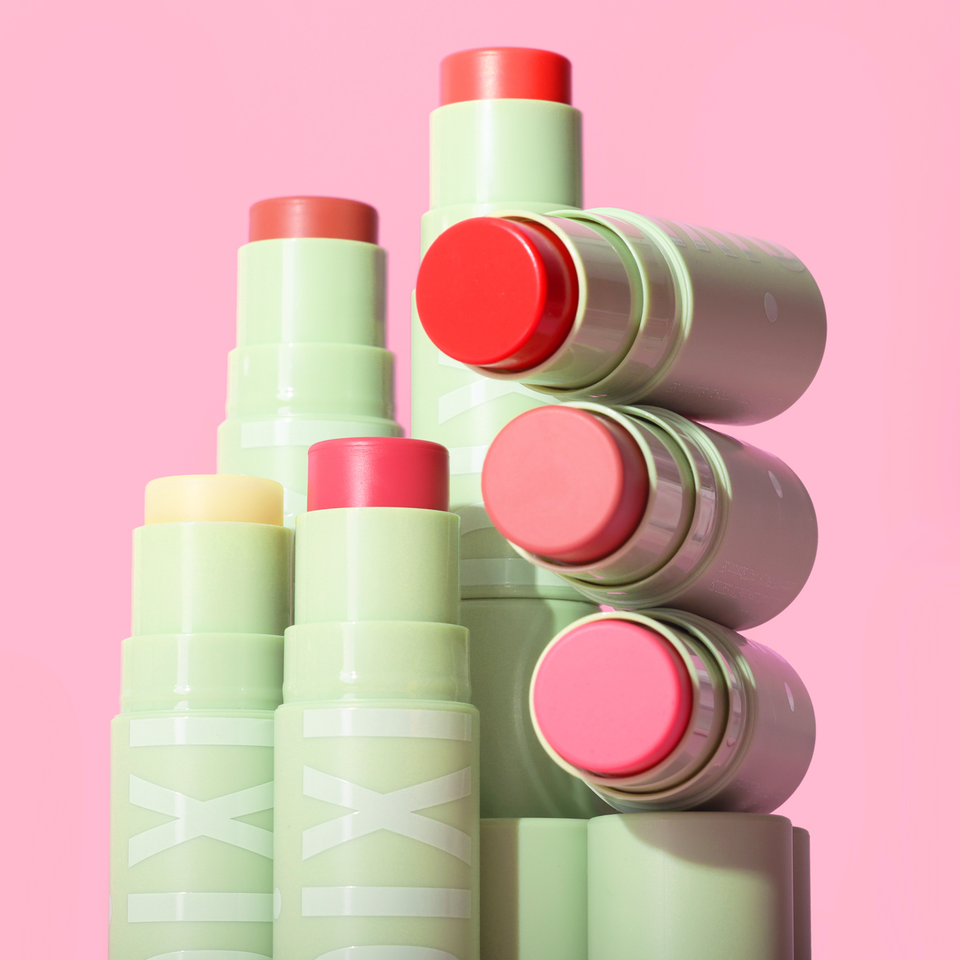 +Hydra LipTreat multiple shades on a pink background view 1