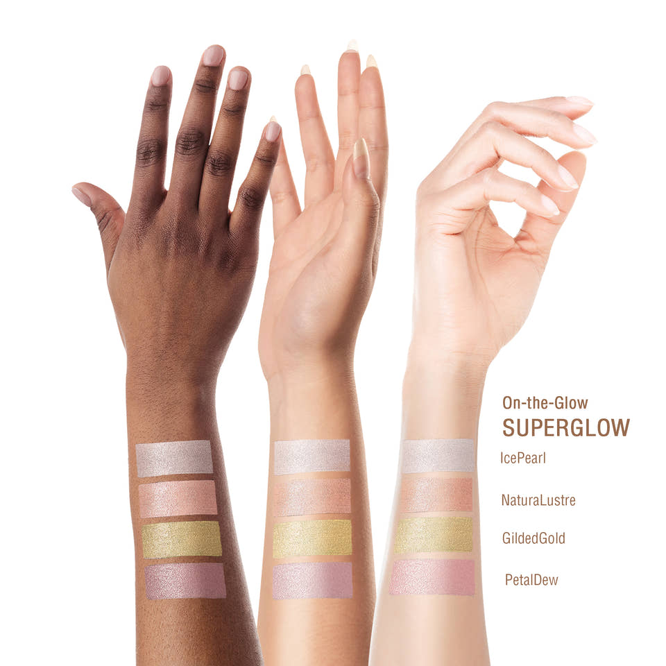 Three human arms with makeup swatches and text reading 'On-the-Glow SUPERGLOW' and shade names 'IcePearl,' 'NaturalLustre,' 'GildedGold,' and 'PetalDew' on a white background. view 2