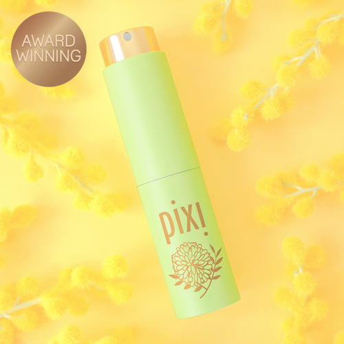 Award Winning: PixiPerfume Mimosa shown on a yellow plant background view 1